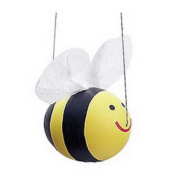 Just three simple steps to make your happy bumblebee yourself. Paint this cute yellow guy with black stripes and attach fishing line and tissue paper wings. It's so funny to see this little guy floating!