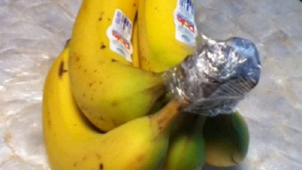 Wrap the ends of the bananas in plastic wrap. It will keep them fresh longer.