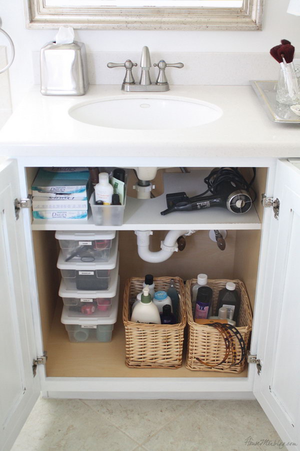 Add a shelf cut out for pipes in the closet. Use storage space above the shelf for the hairdryer. 