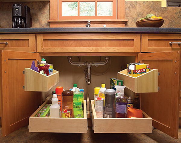 The storage space under the sink is usually dark and dingy. These roll-out trays take everything outdoors and let you find exactly what you need at a glance. 