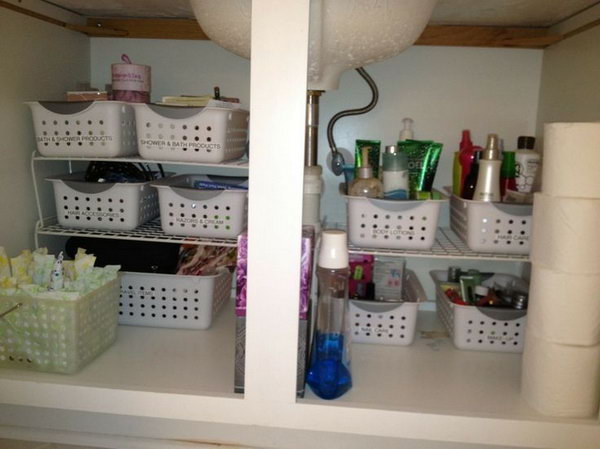 Keep things organized under the sink with the storage baskets. Assemble similar items and label these organizers to help you find items easily. 
