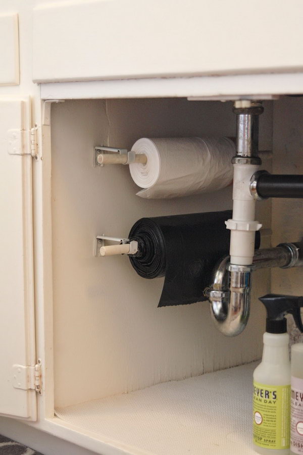 Use your space under the sink and keep your garbage bags on a roll under the kitchen sink. 