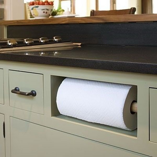Remove your fake drawer in the sink and turn it into a paper towel holder. 
