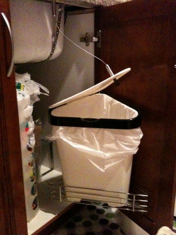 DIY auto-opening trash can. Make a sliding and automatically opening rubbish under the sink. The lid is connected to the sink. When the door opens, the lid opens.  