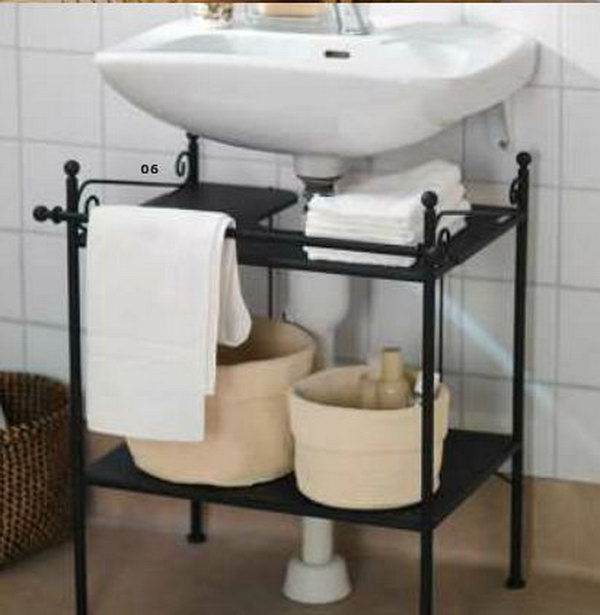 RONNSKAR washbasin shelf. This RONNSKAR shelf from IKEA fits around a pedestal washbasin or the pipe of a wall-mounted washbasin. It squeezes estra storage out of a small bathroom. 