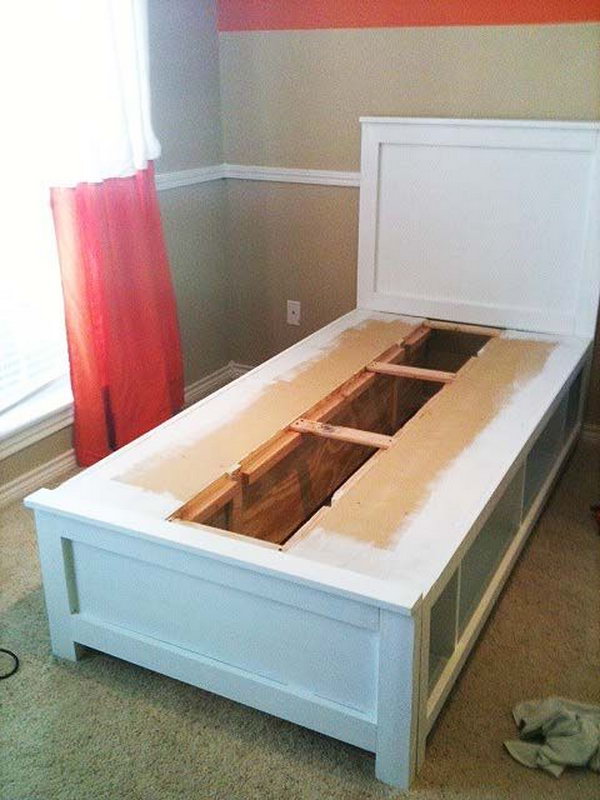 DIY twin bed with storage. A creative storage idea to make shelves or cubes instead of drawers under the bed. Perfect for small spaces. 