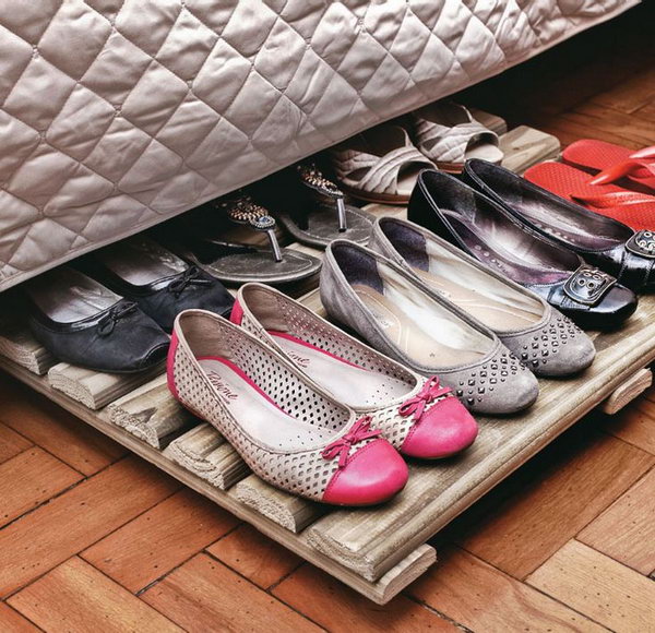 Wooden shelf shoe organizer under the bed. Inexpensive and functional storage solution for your shoe collection. 