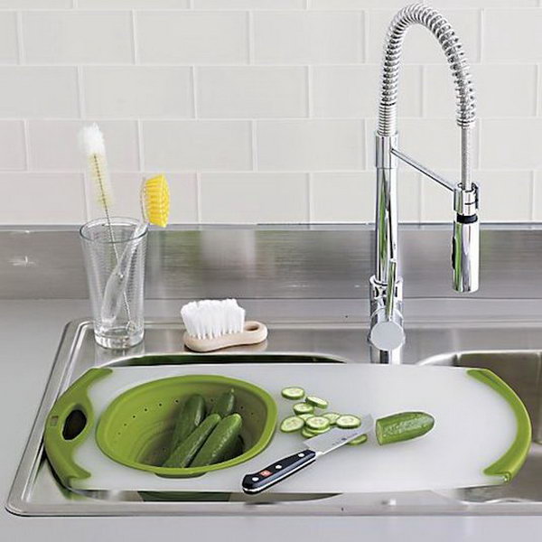 Cutting board over the sink. A cool kitchen device for a small kitchen that doesn't have much storage space. It helps you to create a room where you actually like to cook. 
