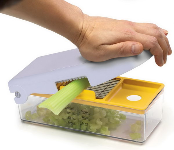 Fruit and vegetable chopper. With this hand chopper, you can easily chop, dice, slice and cut in seconds. Simply place the item on the stainless steel blade grille and swivel the top lid down with a quick movement. The food is cut into the measuring container provided. 