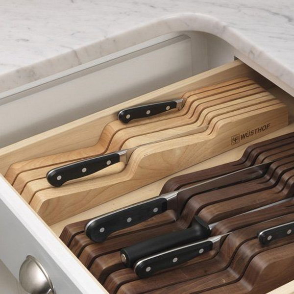 In-drawer knife organizer. Place knife blocks in a drawer so that the knives do not rattle around. This storage compartment fits perfectly into a drawer and saves space in the kitchen. 