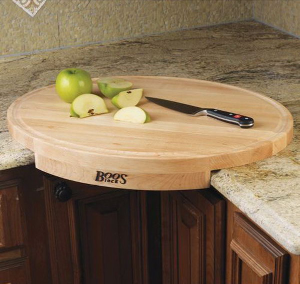 John Boos corner cutting board. This oval maple chopping board transforms a counter corner into an efficient work space. 