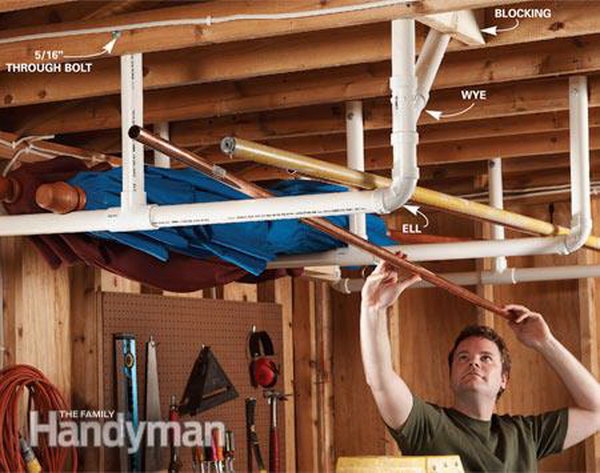 Overhead garage storage. Mount the PVC pipes on the ceiling to store long objects. A great way to keep your garage open and neat.  
