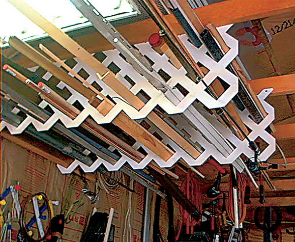 Garage ceiling grille. Hangs scrap sections made of plastic mesh to store everything from molded parts to fishing rods. Due to the open design of the grid, you can quickly see the items stored overhead and have easy access to them. 