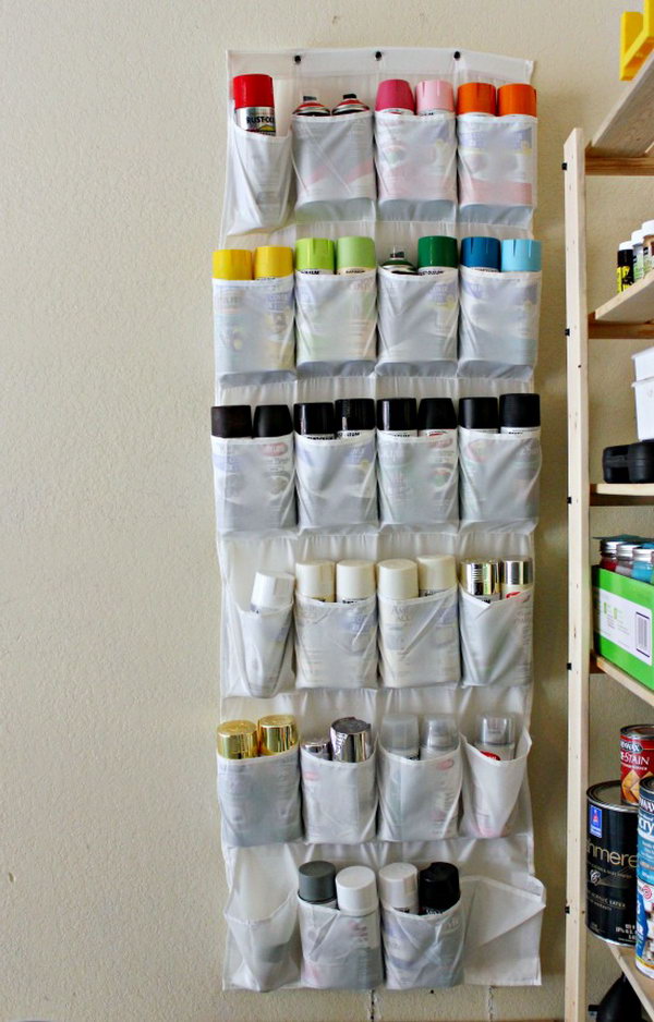 Garage storage with shoe organizer. A great idea to recycle your old things and prevent the spray paints from spreading across shelves and containers. 