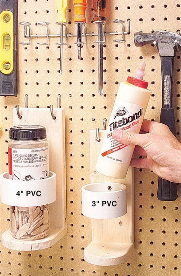 PVC pipe and wooden bracket for storage in the garage mounted on the breadboard. Organizing garages can be a lengthy and costly process, but it saves time and ultimately money.