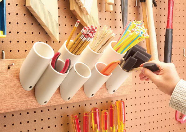 Storage bags for PVC pipes for thin things. Screw PVC pipes to a plate to hold brushes, pencils, and stir sticks. A great idea for a number of organizational requirements: in the garage, in the office or for your craft room. 