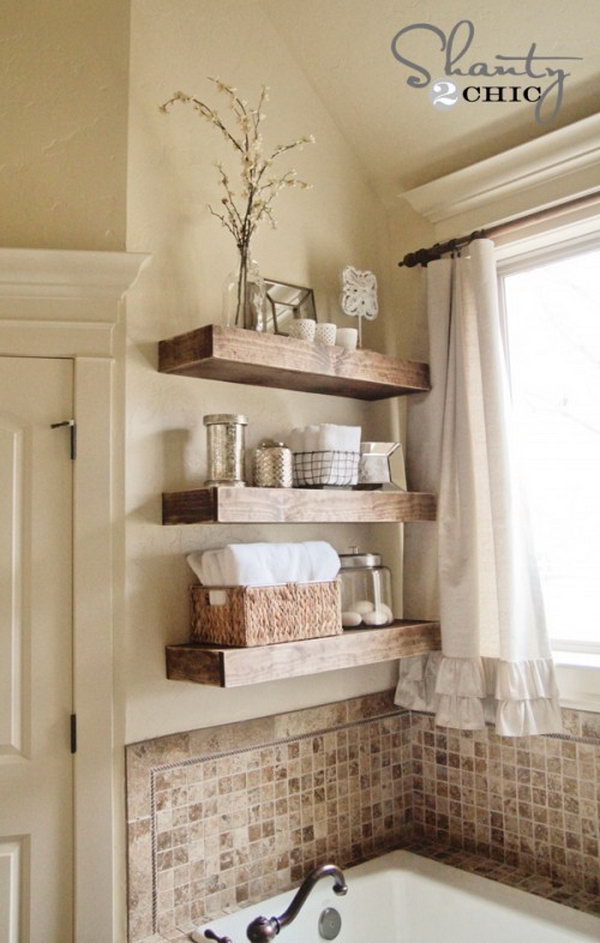 DIY floating shelves over the bath. Organize your swimwear with these rustic floating DIY shelves. They are chic, slim and much easier to tinker than they look. 