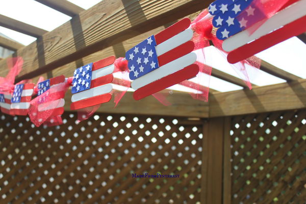 Popsicle stick flags. It's fun to paint and glue to put this great banner together. You could even stick a crayon on the underside of the flag and use them as fans to cool you down on a hot fourth of July. 