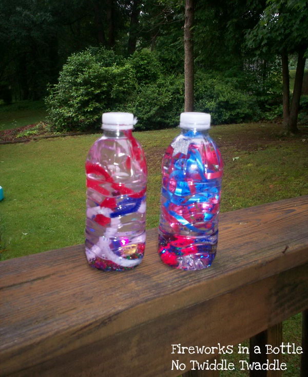 Fireworks in a bottle. Fill the empty water bottle with red, white, and blue curly ribbon, glitter stars, confetti, and buttons. Perfect for a patriotic vacation. 