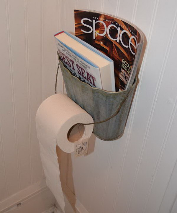 This metal basket was recycled as a magazine and toilet paper holder. 