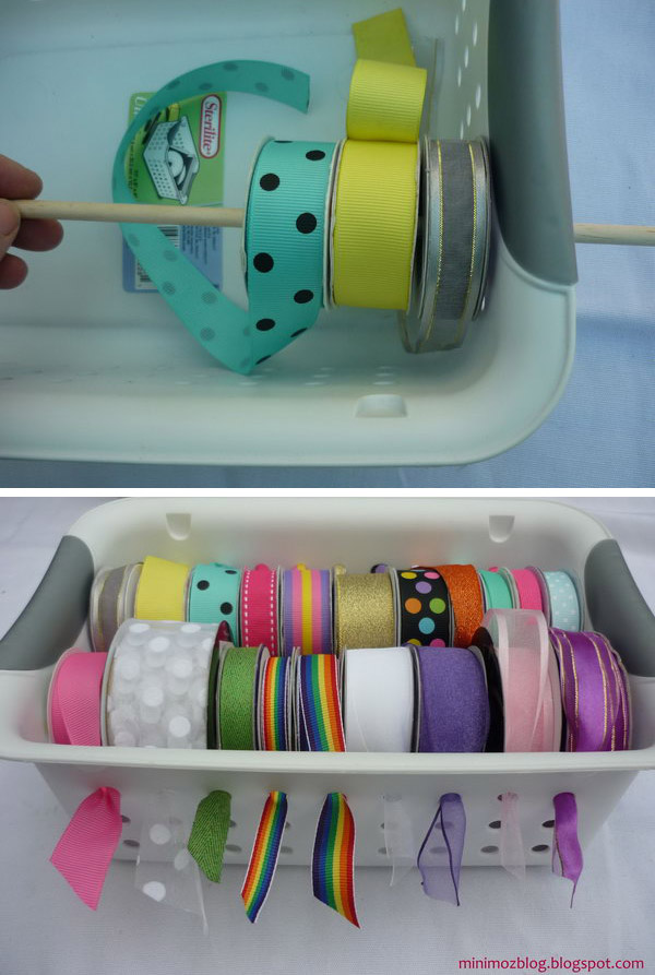 Push the dowel rods through a plastic basket to get a practical and functional solution for storing the wrapping tape.  