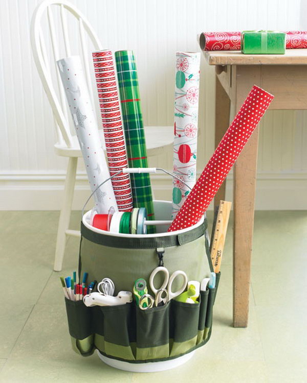 Make a portable gift wrap station with a bucket and garden bucket caddy. 