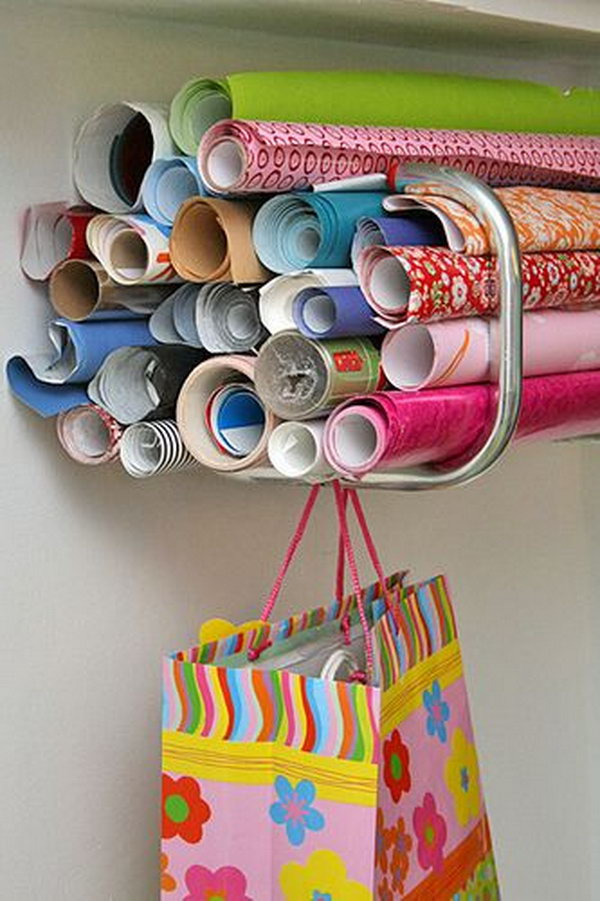 It's a smart idea to organize wrapping paper with bike racks.  