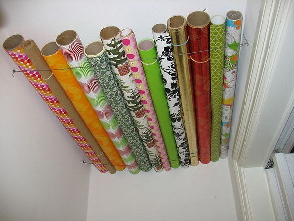 Store your wrapping paper in a closet with wasted ceiling space. 