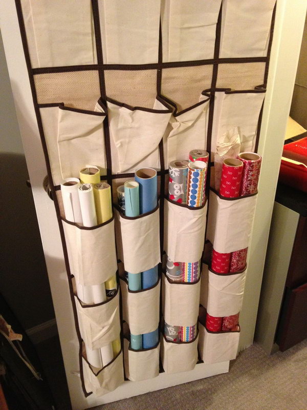 Cut the bottoms off the shoe bags and use them as an organizer for wrapping paper.  