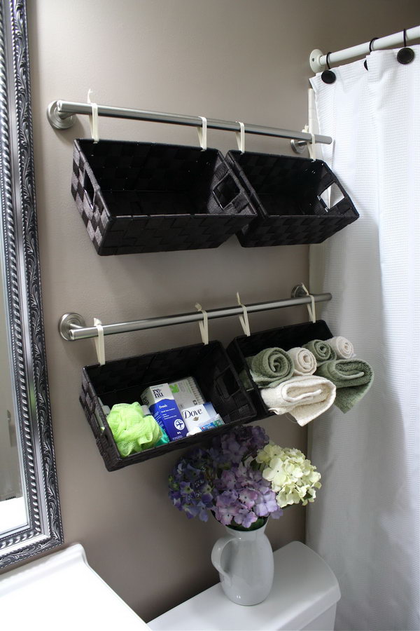 Hang these baskets over the toilet to store toiletries, washcloths or towels, and they'll look good. 