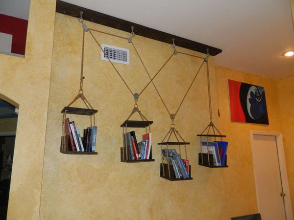 These dynamic hanging shelves can be repositioned as desired and respond to the number of books stored on each shelf.  