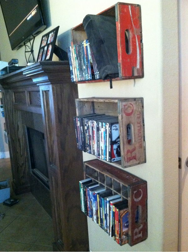 Attach these vintage beverage crates to the wall on both sides of the fireplace for DVD storage. 