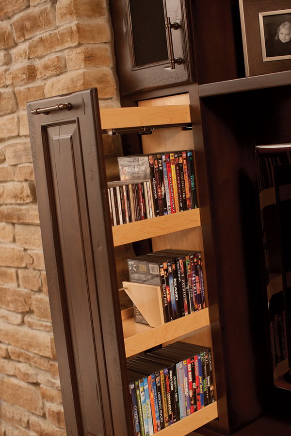 These drawers with an adjustable DVD or CD file system are perfect for keeping films organized but not visible. 