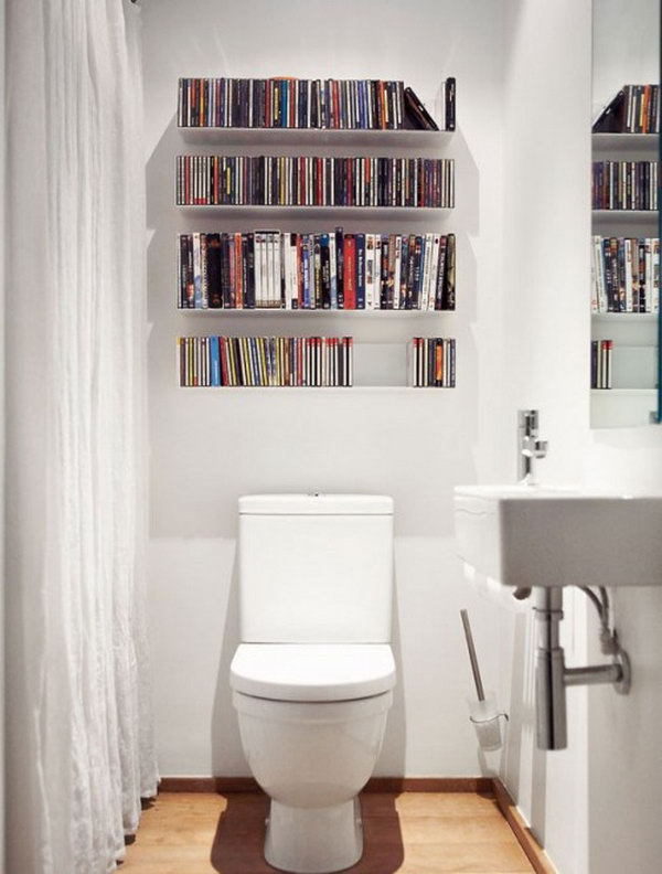 Get your DVDs completely out of your living area by storing them on shelves in the bathroom. Unusual but clever idea. 
