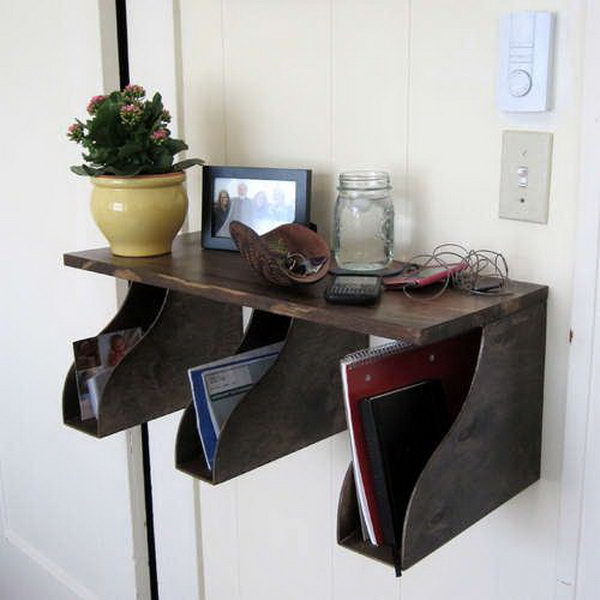 Make a practical storage station with a shelf and some IKEA magazine holders. Place this right next to the door and you will never wonder where your keys or phone went to. 