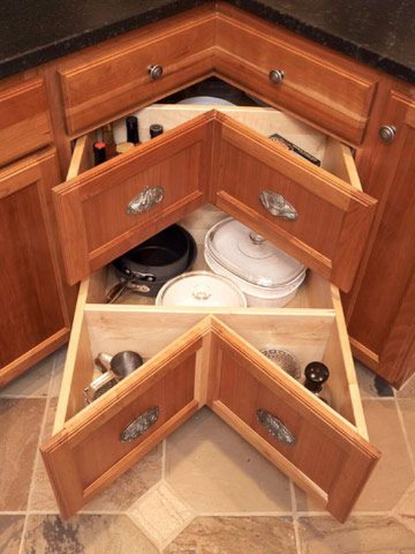 Instead of having the long dark cave of a closet, the corner drawers make better use of your counter corners. 