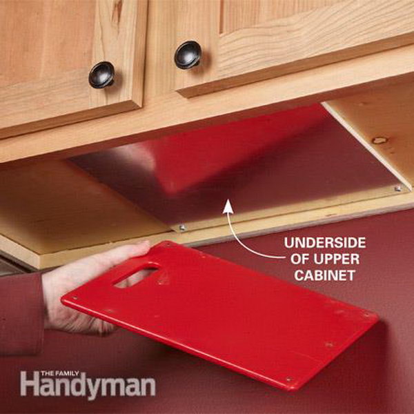 Magnetize your cutting boards and hide them under your cupboards 