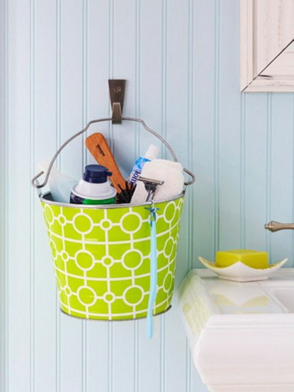 Colorful metal buckets hanging on the wall would be cute in a children's bathroom. 
