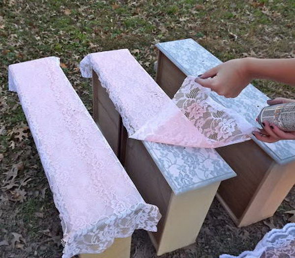 Transform furniture with lace and spray paint. 