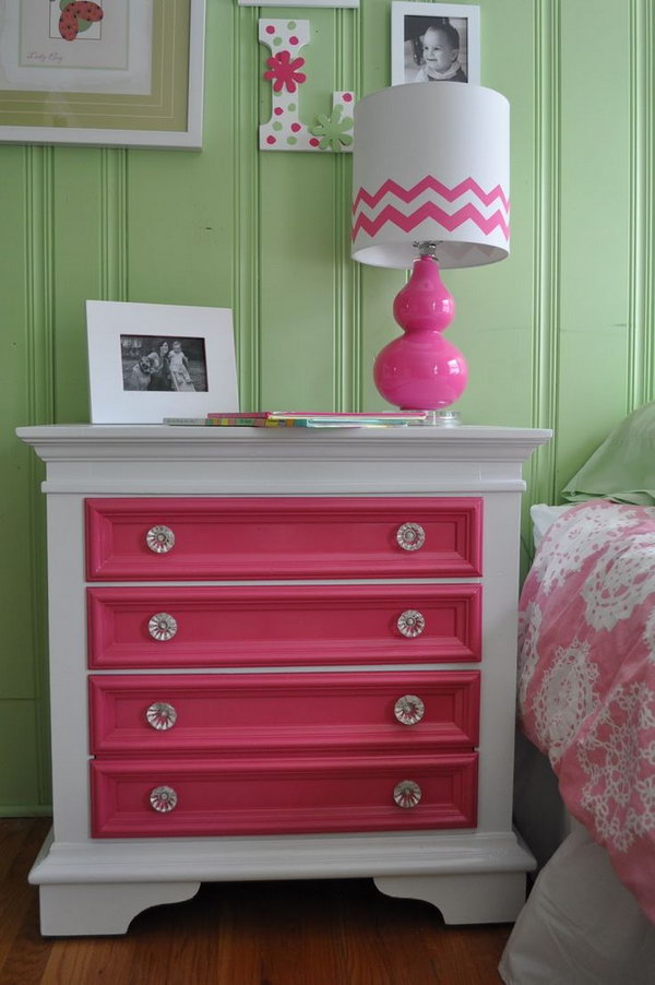 Take a simple bedside table and just add bright colors to the drawers. 
