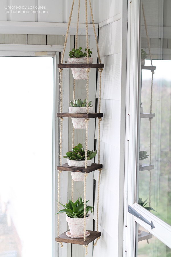 DIY Vertical Plant Hanger Tutorial. This project makes a nice display for your potted plants without taking up a lot of space. Perfect for a small balcony garden. 