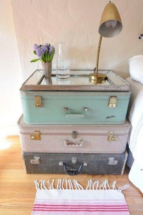 Stacked on top of each other, two or three suitcases can serve as a striking yet perfectly functioning DIY bedside table.