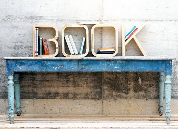 This set of B-O-O-K serves as a book store. The letters are handmade creations by experienced woodworkers who use water-based paints and seals.  