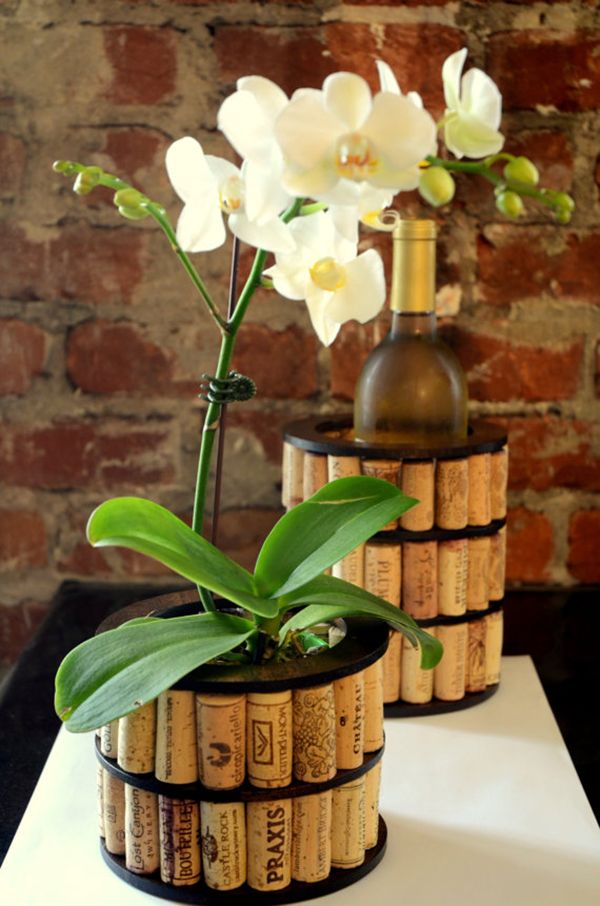 Recycled wine cork vase. These container gardening ideas are a great way to brighten up your surroundings instantly. Make your home unique and interesting in a different way.