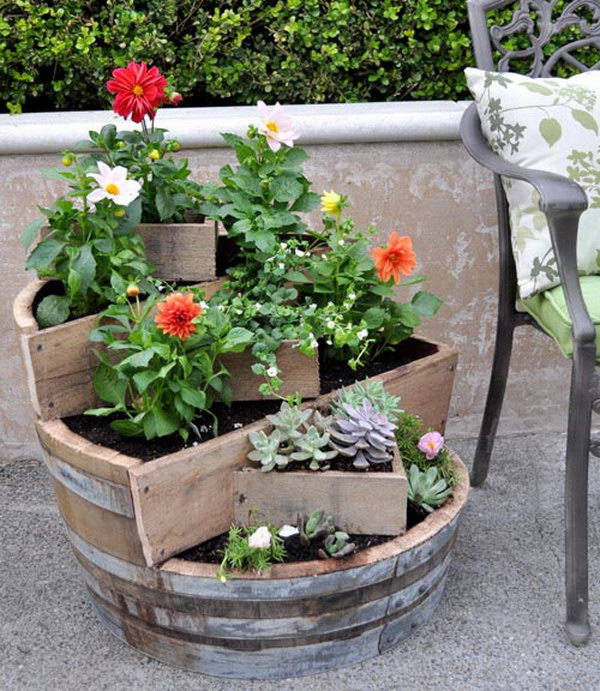 DIY recycled barrel garden pots. These container gardening ideas are a great way to brighten up your surroundings instantly. Make your home unique and interesting in a different way.