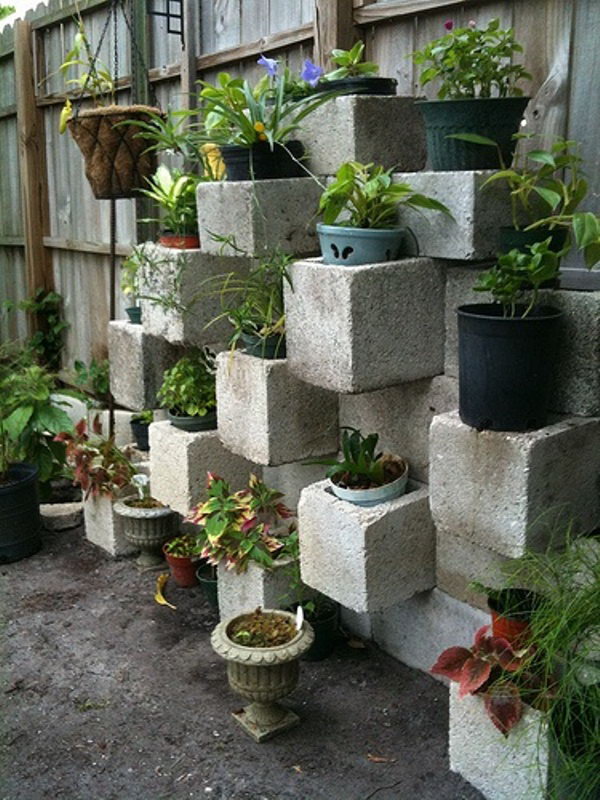 Cinder block focus vertical planter. These container gardening ideas are a great way to brighten up your surroundings instantly. Make your home unique and interesting in a different way.