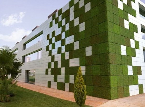 Modular tetris garden. It allows plants to extend upwards instead of growing along the surface of the garden. Doesn't take up much space and looks so beautiful at the same time.