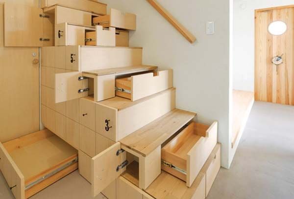crazy stairwell. The space under a staircase can be used to clear everyday clutter.