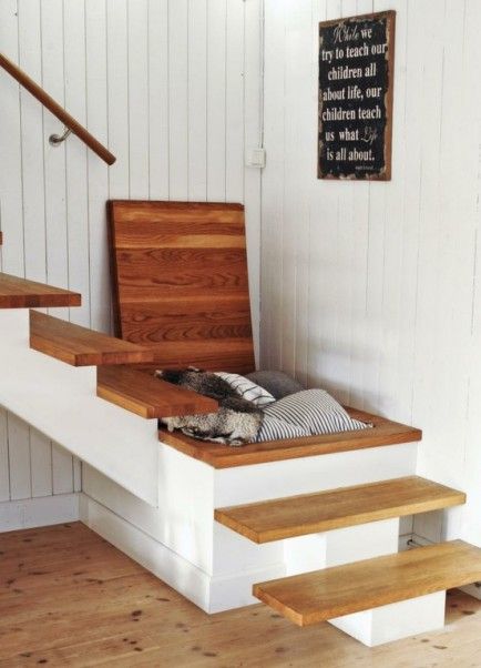 hidden stairwell. The space under a staircase can be used to clear everyday clutter.