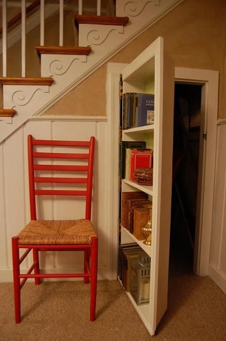 secret bookcase under the stairs. The space under a staircase can be used to clear everyday clutter.